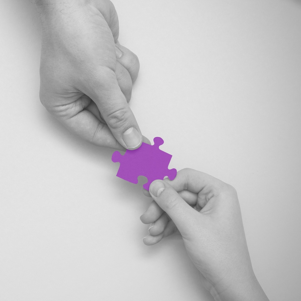 World autism awareness day. Hands holding jigsaw puzzle. World Autism spectrum disorder