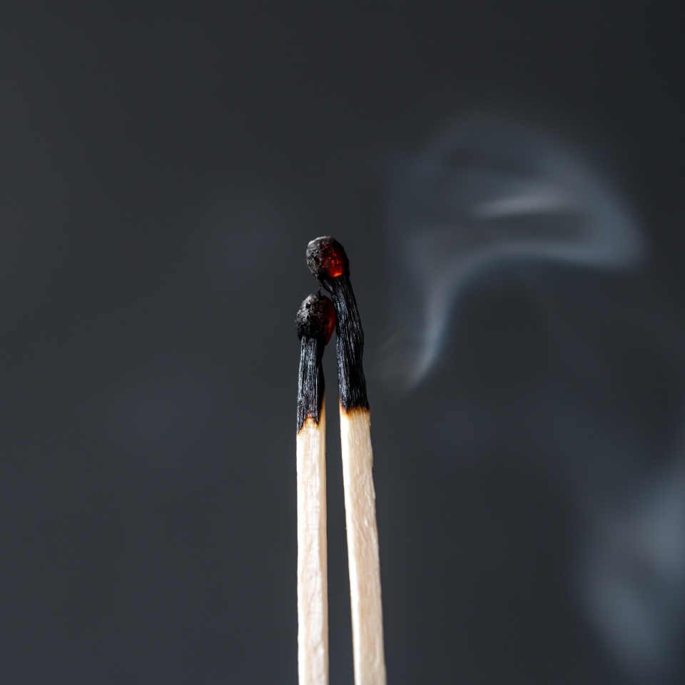 Burned matches. Abstract concept of burnout in couple, copy space
