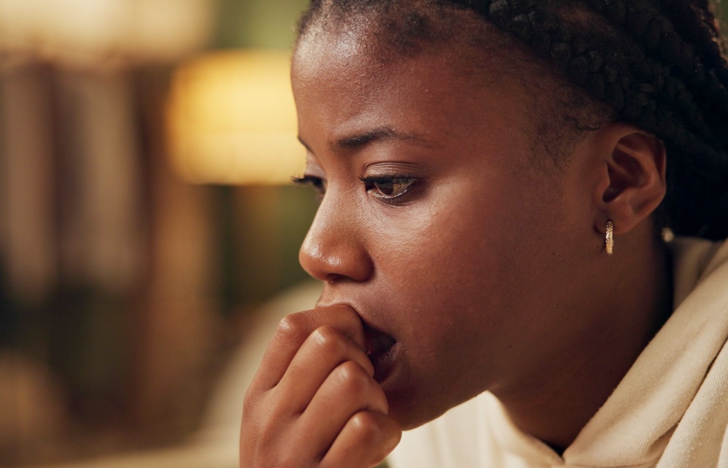 Anxiety, thinking and black woman in home with stress from financial loan, student debt and crisis. College, finance and girl with worry about problem, fear and coping with conflict in mental health